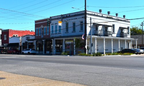 Corner of West Pine Street and South 6th St. Two-story brick commercial structure dating back to c. 1908.